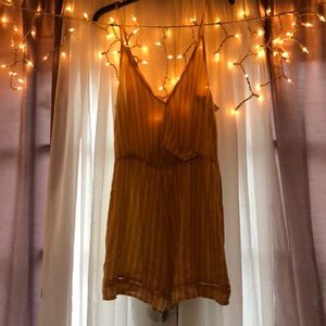 Yellow and white striped romper from PacSun